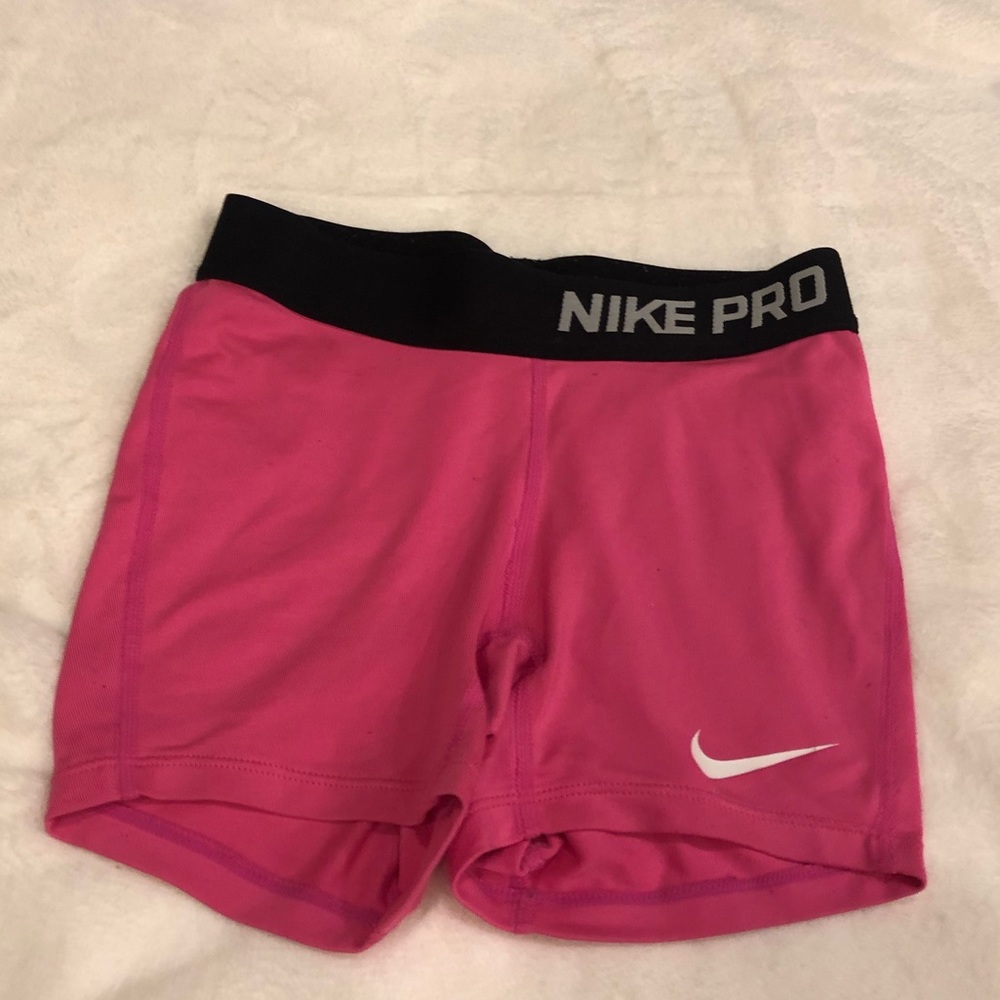 pink nike pros size youth small